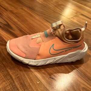 Nike tennis shoes, coral